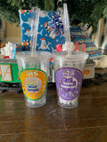 customized clear tumblers with straw under a christmas tree